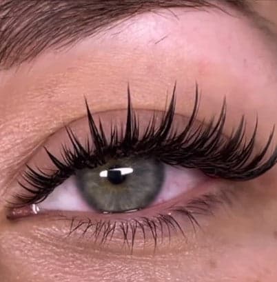 Close-up of wet-look eyelash extensions